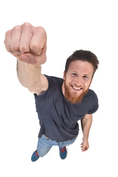 Мужчина с поднятым кулаком на белом — стоковое фото