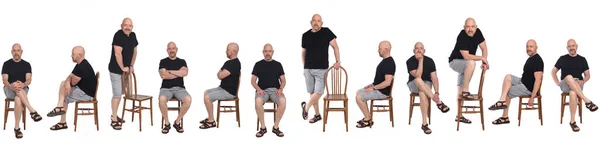 Velká Skupina Stejného Plešatého Muže Šortkách Sedí Pozadí — Stock fotografie