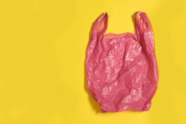 Plastic Bag Yellow Background — Stock Photo, Image