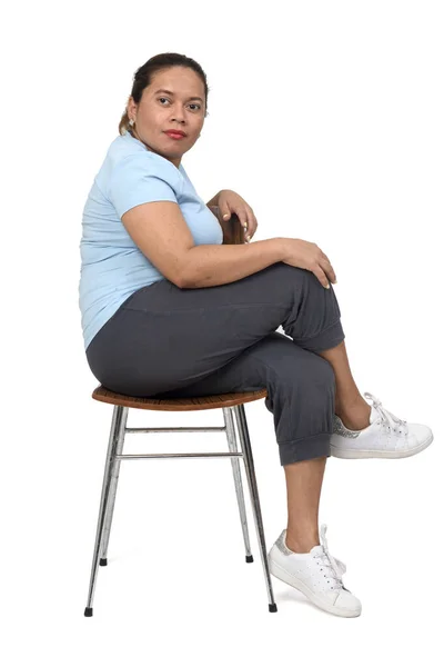 Side View Woman Sitting Chair Looking Camera White Background Arms — Stock Photo, Image