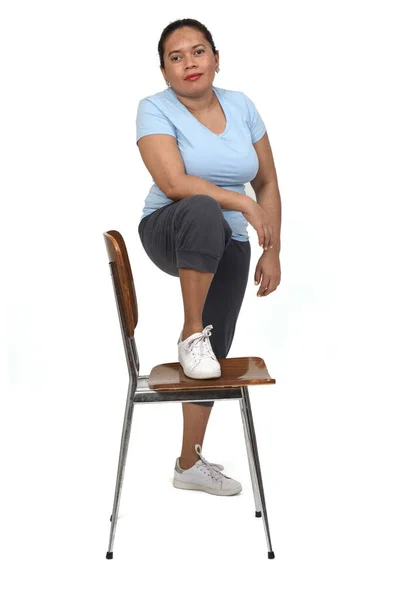 Portrait Woman Playing Chair Looking Camera White Background — Stock Photo, Image