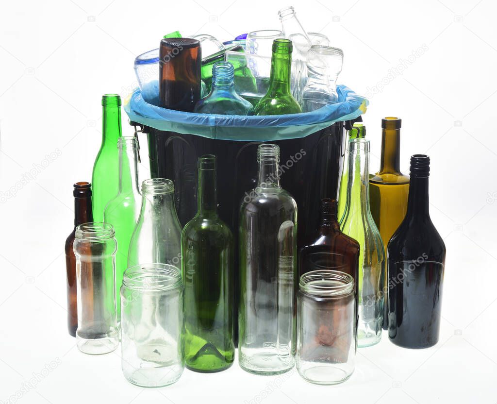 group of garbage and jars can with bottles for recycling on white background