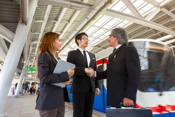 Two Asian Business Partner Shaking Hands Sky Train Station — Stock Photo, Image