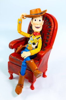 Bangkok, Thailand - March 27, 2016 : A studio shot of the Disney Infinity character Woody from the movie Toy Story. clipart