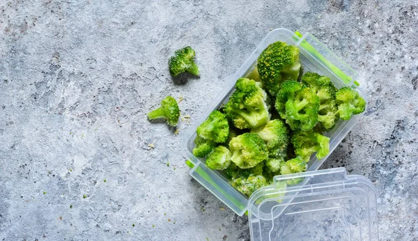 Frozen Broccoli Lunch Box Concrete Background Space Text — Stock fotografie