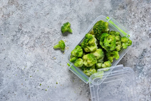 Frozen Broccoli Lunch Box Concrete Background Space Text — Stock fotografie