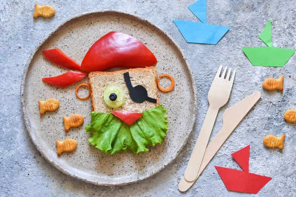 Funny food for children - pirate sandwich. Lunch for children.