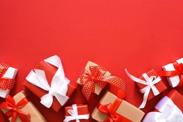 Many Beautiful Gift Boxes Ribbons Red Background Birthday Celebration — Stock Photo, Image