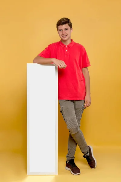 Studio Shot Smiling Young Boy Holding White Billboard Copy Space — Stock Photo, Image