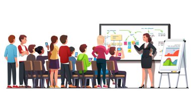 Genç öğrencilere ders veren birinci sınıf bir kadın.