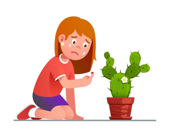 Mädchen weint über gestochenen Finger des Kaktusdorns — Stockvektor