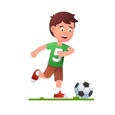 Çocuk futbol oynuyor. Futbol üniformalı çocuk.
