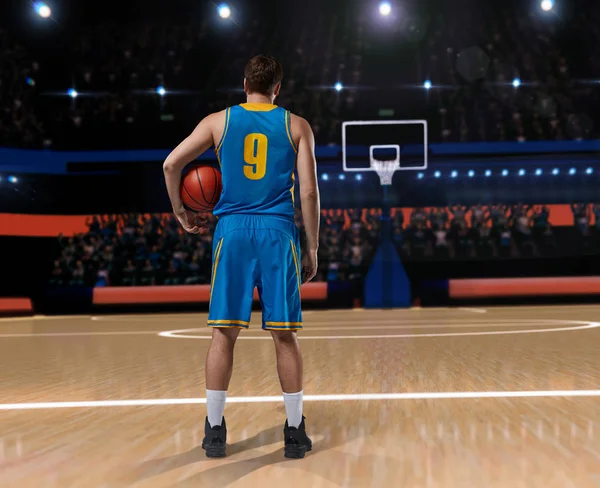 Basketbalový hráč stojící na košíkovou — Stock fotografie