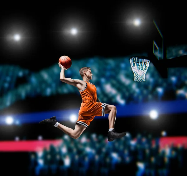 basketball player making slam dunk on basketball arena