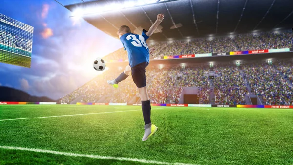 Kid football player hitting the ball on a soccer stadium — Stock Photo, Image