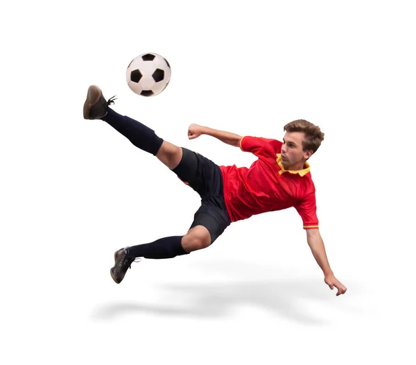 Futbolista pateando la pelota en el aire aislado en blanco — Foto de Stock