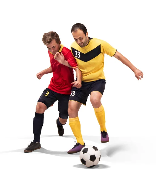 Two fotball players struggling for the ball isolated on white Stock Photo