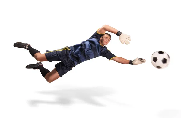 Goalkeeper flying for the ball isolated on white Royalty Free Stock Photos