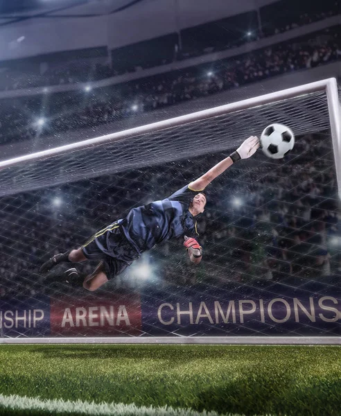 Goalkeeper jumping for the ball on football match Royalty Free Stock Photos