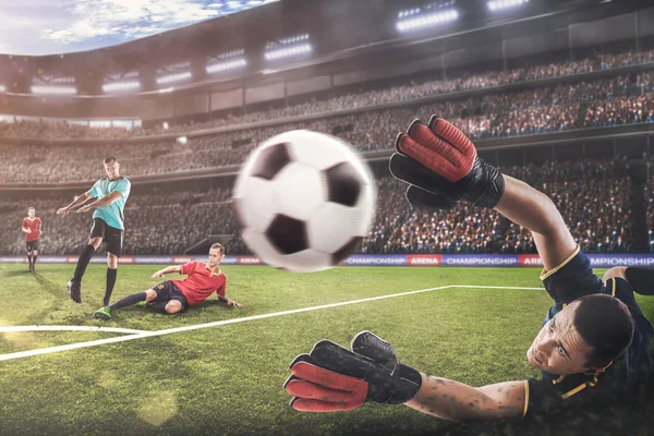 Goalkeeper jumping for the ball on football match Royalty Free Stock Images