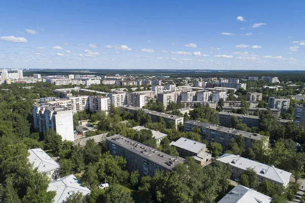 Top down aerial drone image of a Ekaterinburg city in the midst of summer, backyard turf grass and trees lush green. — Stock Photo, Image