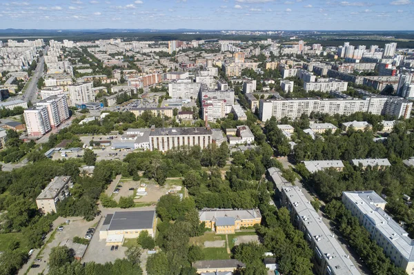 Top down aerial drone image of a Ekaterinburg city in the midst of summer, backyard turf grass and trees lush green. — Stock Photo, Image