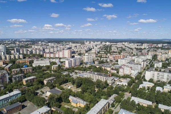 Top down aerial drone image of a Ekaterinburg city in the midst of summer, backyard turf grass and trees lush green. — Stock Photo, Image