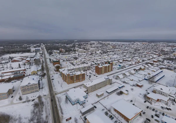 Yugorsk city. Aerial. Winter, snow, cloudy. Khanty Mansiysk Autonomous Okrug (HMAO), Russia. — Stock Photo, Image