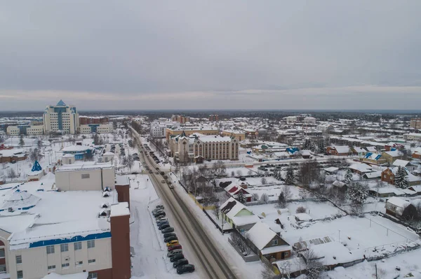 Yugorsk city. Aerial. Winter, snow, cloudy. Khanty Mansiysk Autonomous Okrug (HMAO), Russia. — Stock Photo, Image