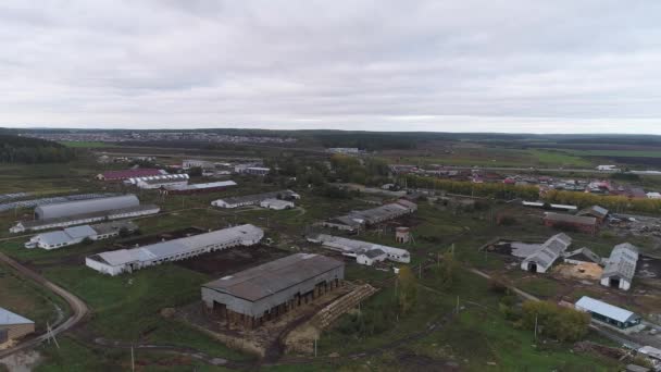 Aerial View Farm Village Many Cowsheds Moving Tractors Tractor Dropping — Stock Video