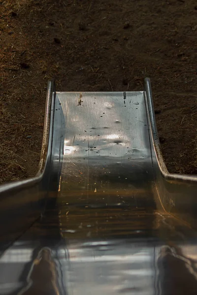 End of an old fashioned silver slide — Stock Photo, Image