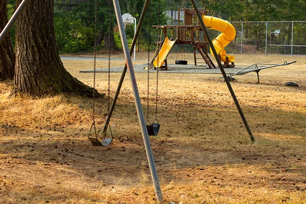Old fashioned playground in late summer day — Stock Photo, Image