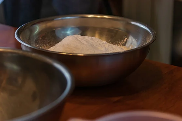 White all purpose flour pilled in a silver bowl — Stock Photo, Image