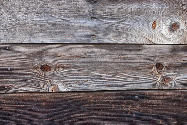 Oude versplinterd houten getextureerde muur beschadigd met leeftijd — Stockfoto