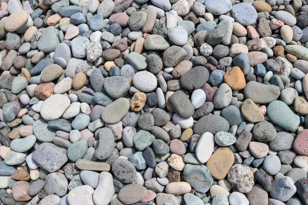 滑らかな丸い小石のテクスチャ背景 小石海ビーチ クローズ アップ — ストック写真