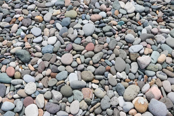 滑らかな丸い小石のテクスチャ背景 小石海ビーチ クローズ アップ — ストック写真
