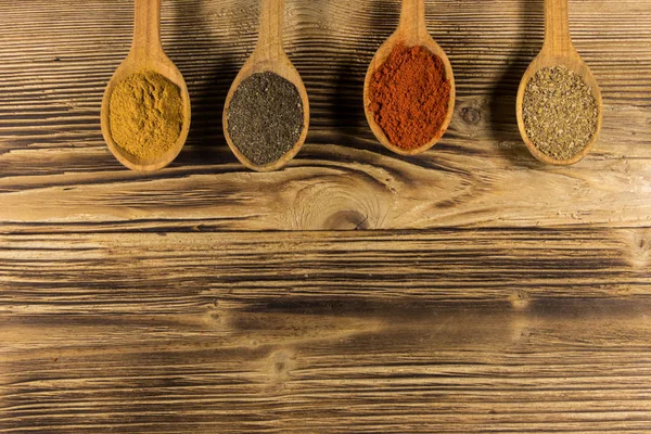 Assorted Spices Wooden Spoons Table Top View — Stock Photo, Image