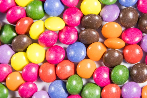 Fondo Los Coloridos Caramelos Forma Botón Llenos Chocolate — Foto de Stock