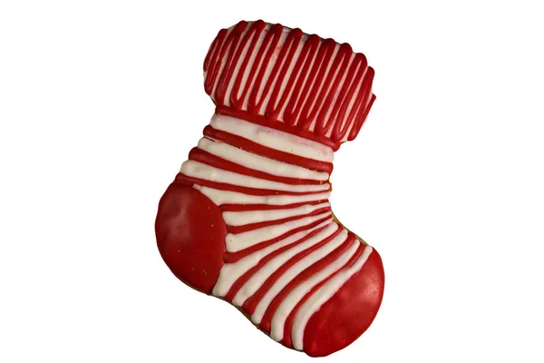 白い背景に分離されたクリスマス靴下の形をしたクリスマスのジンジャーブレッドのクッキー — ストック写真