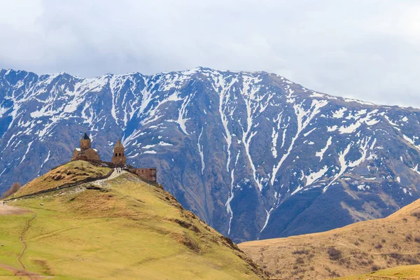 Gergeti Trinity Church (Tsminda Sameba), Holy Trinity Church near the village of Gergeti in Caucasian mountains, Georgia