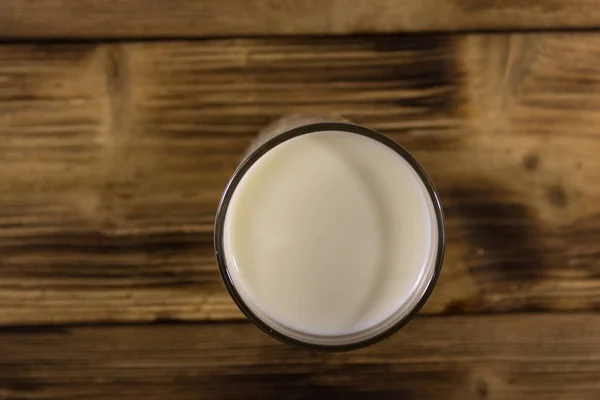 Glas Mjölk Träbord Ovanifrån — Stockfoto