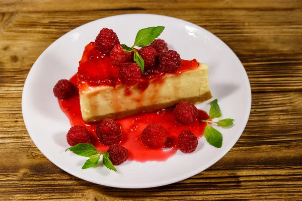 Piece Tasty New York Cheesecake Raspberries Raspberry Jam White Plate — Stock Photo, Image