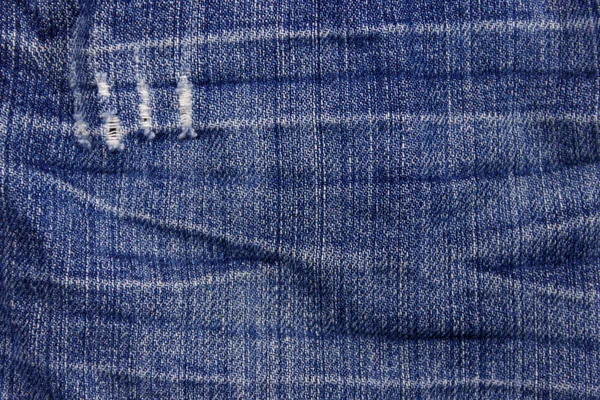 Jeans fundo textura. Parte do jeans azul — Fotografia de Stock
