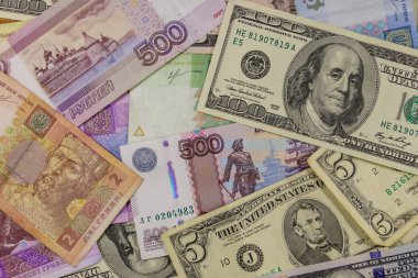 Amerikan dolarlarının, Rus rublelerinin ve Ukrayna Hryvnialarının çok yönlü geçmişi