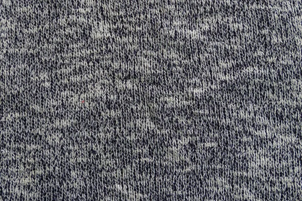 Textura de tricô cinza. Fundo de pano de malha — Fotografia de Stock