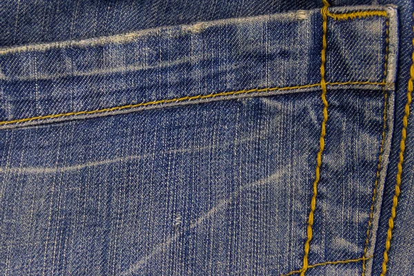 Jeans texture fond. Une partie du jean bleu — Photo