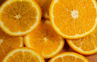 Dilimlenmiş sulu portakal meyvelerinin arka planı