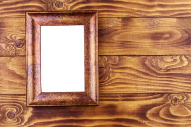 Ahşap arka planda boş fotoğraf çerçevesi. Üst görünüm