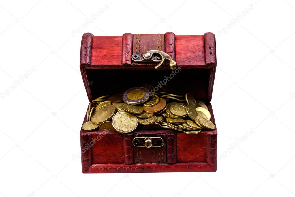 Vintage treasure chest full of golden coins isolated on white background