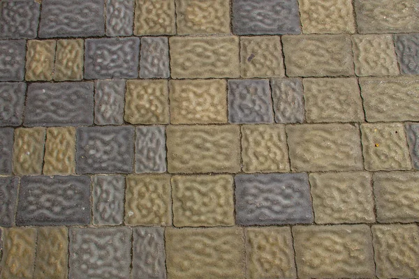 Fondo texturizado de acera. Detalle de un pavimento — Foto de Stock